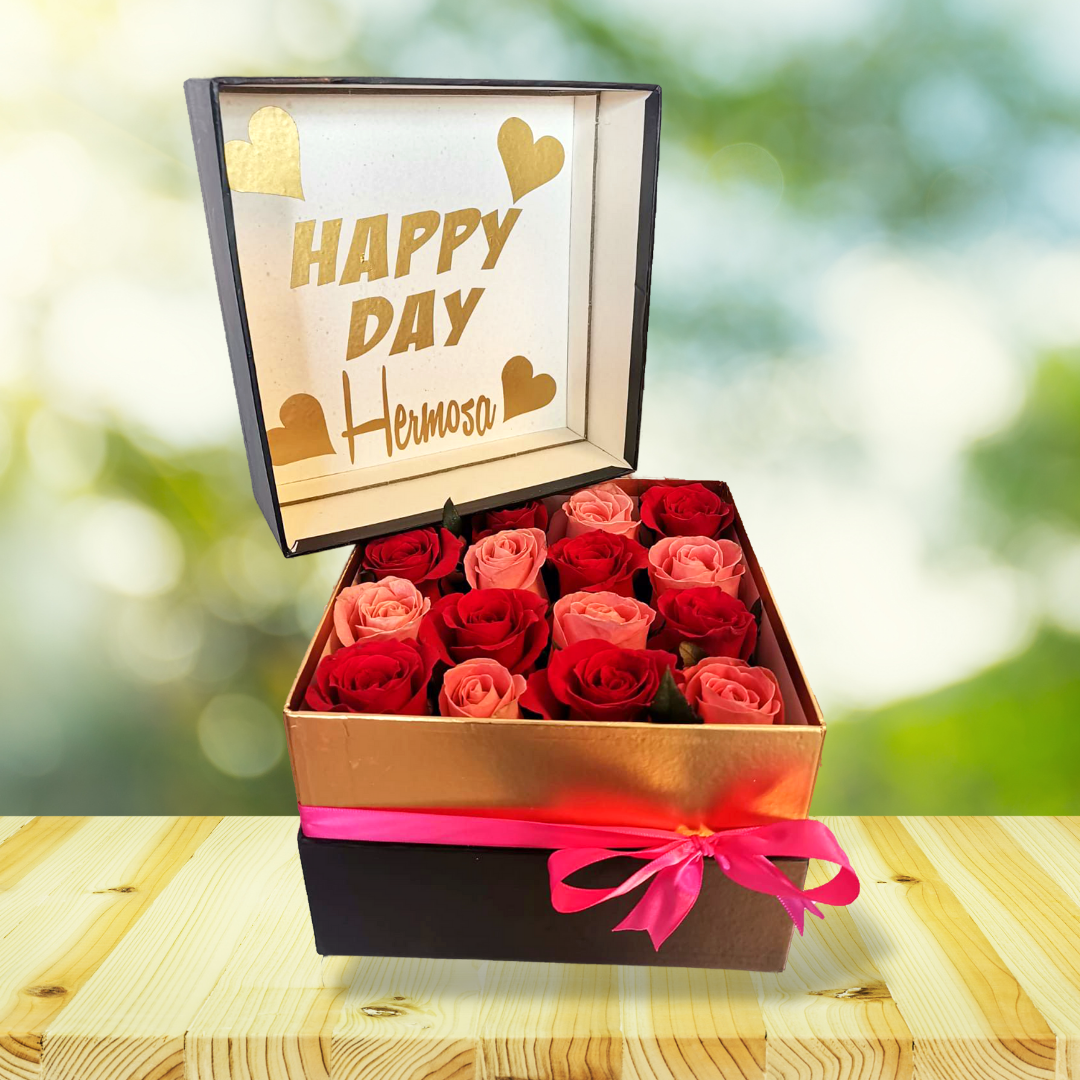 Caja con 12 rosas y 1 girasol