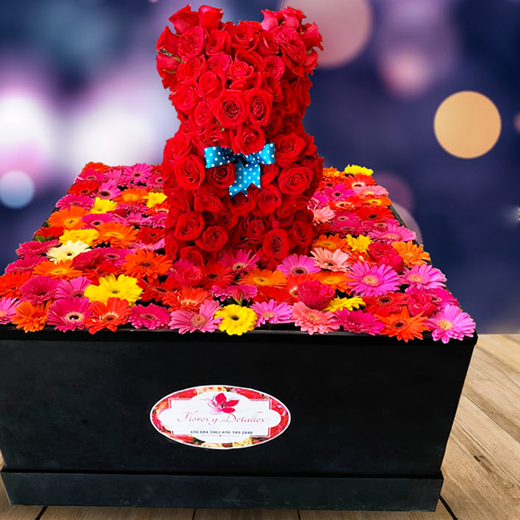 Caja gigante con 130 gerberas y oso 3D de rosas