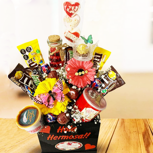 Caja "Hola hermosa" con 2 gerberas y dulces